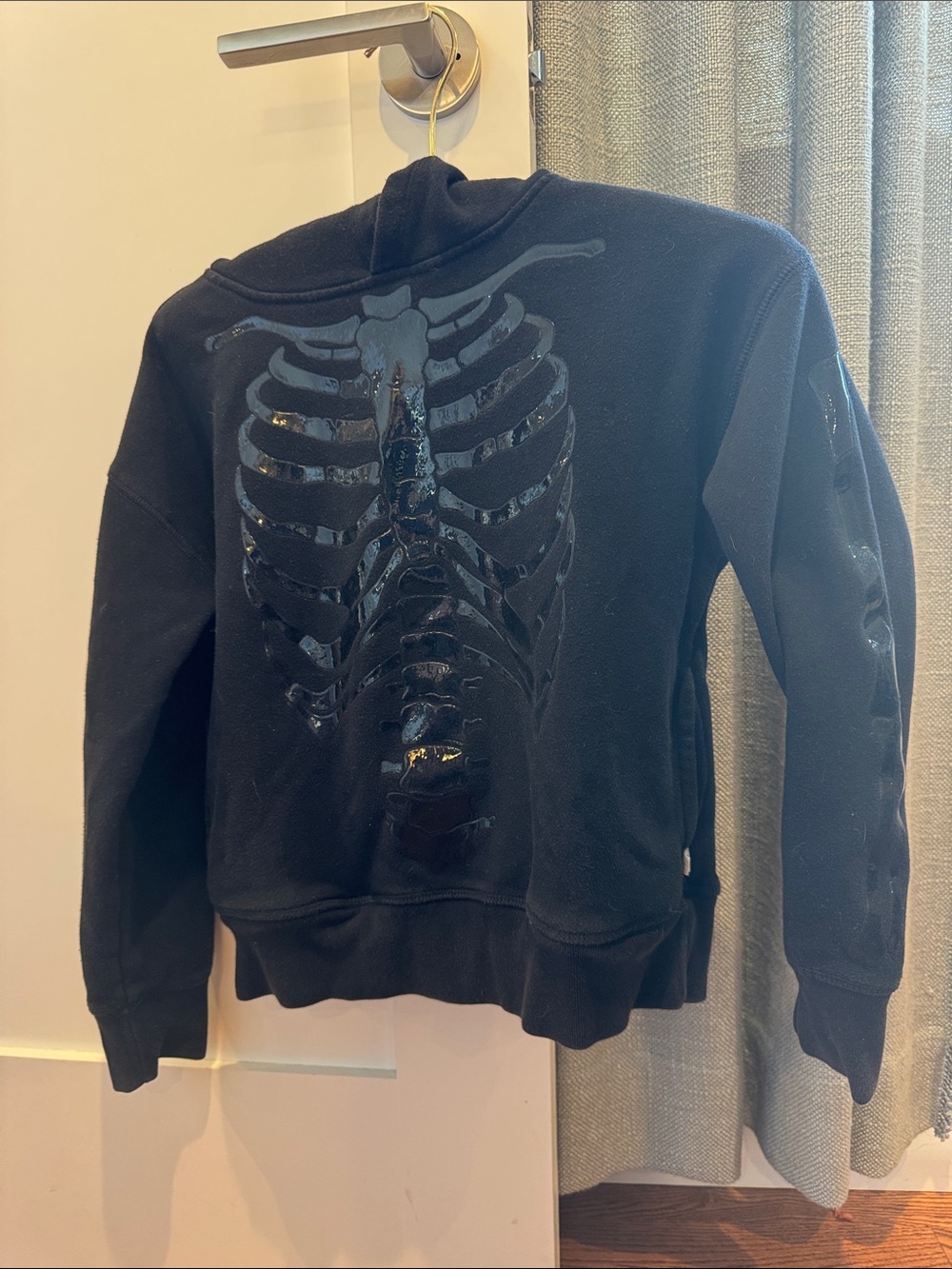 GAP Black Pullover Hoodie with Glossy Rib Cage Graphic